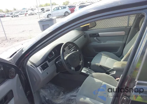 2004 Suzuki Forenza S из США, поврежденный, VIN KL5JD52Z44967910